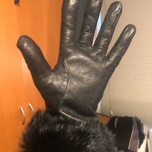 Black leather gloves with fur trim
